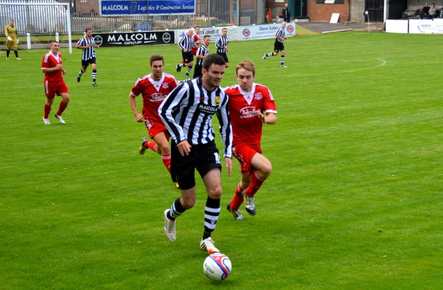 Andy Reid leads the charge for the opening goal